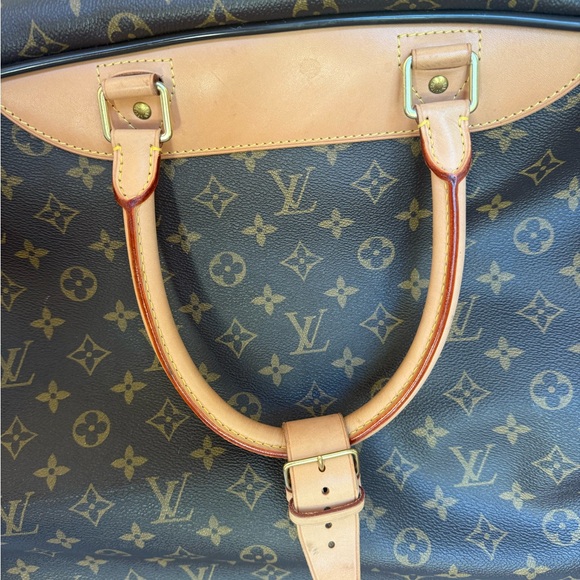 Louis Vuitton canvas rolling duffle bag, gently used. - Picture 5 of 14